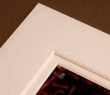 Load image into Gallery viewer, A corner section showing double matting with 6 ply (not 4 ply) Crescent White Glove mat board with a third layer as a spacer. 